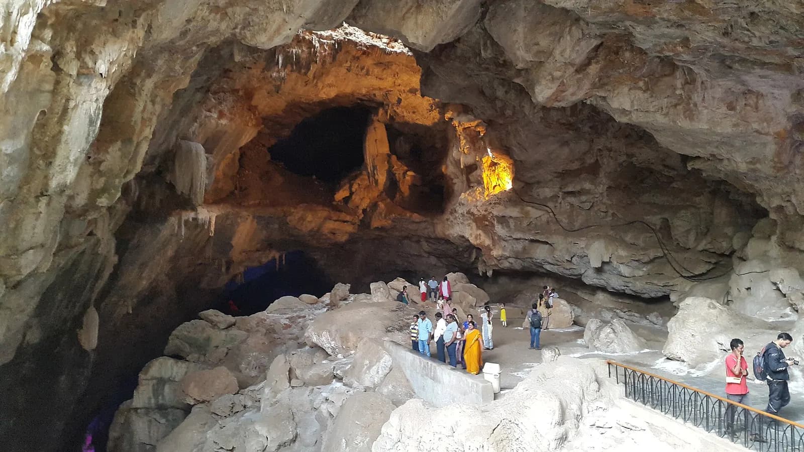 Lit stalactite formations inside the Borra Caves on the Eastern Ghats road up to Araku Valley