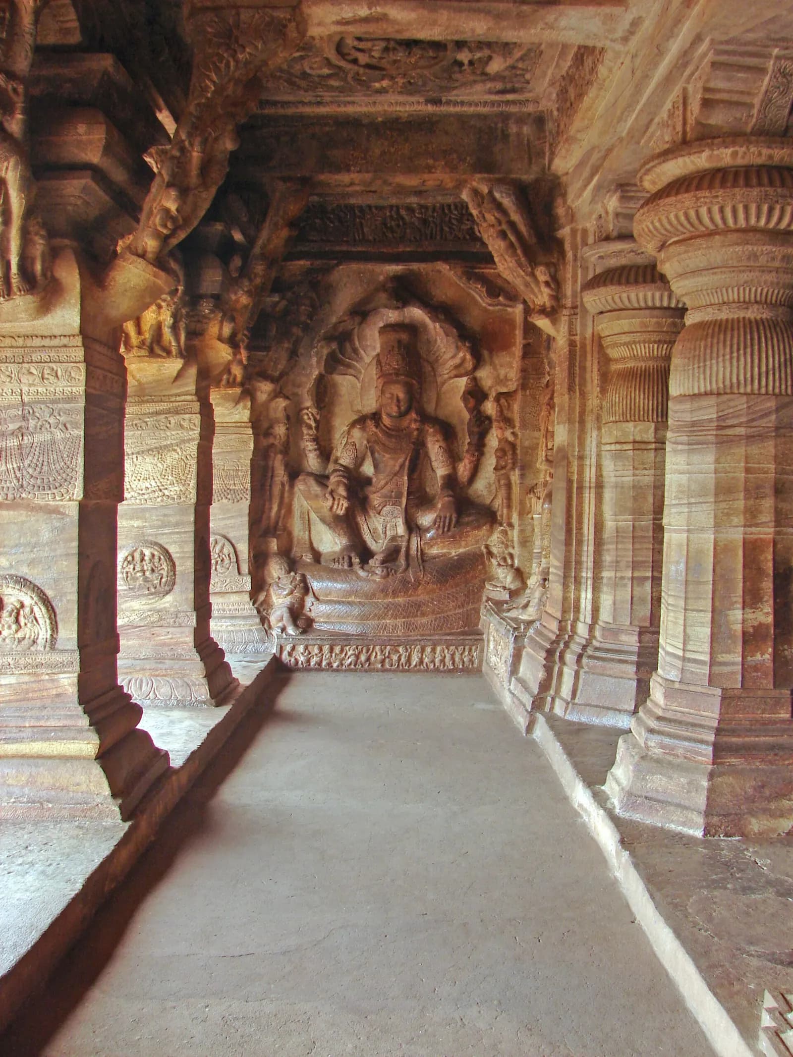 Chalukyan rock-cut cave temples in the red sandstone cliff above Agastya lake at Badami