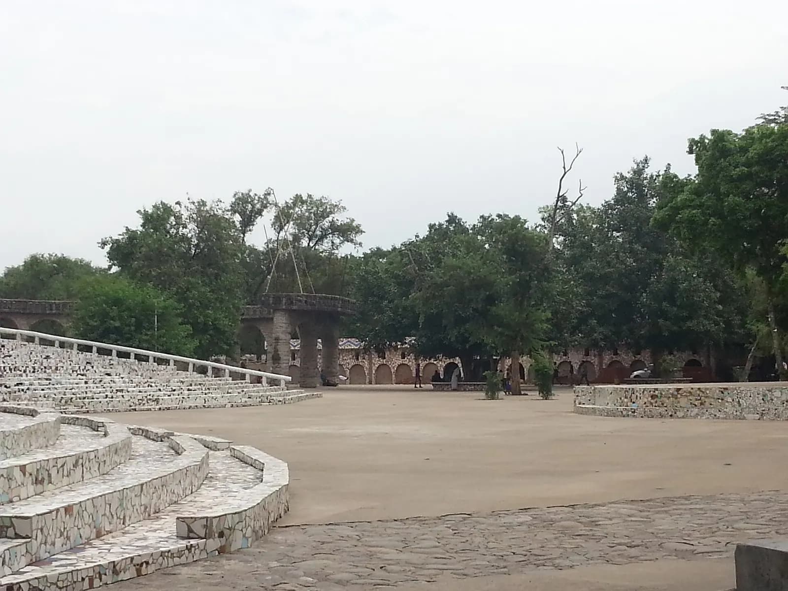 Sculpted figures and waterfalls in Nek Chand's Rock Garden of Chandigarh