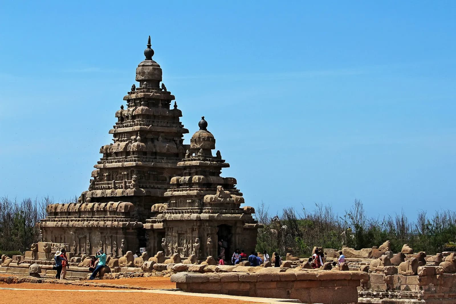 The twin granite towers of the Shore Temple at Mahabalipuram standing above the Bay of Bengal
