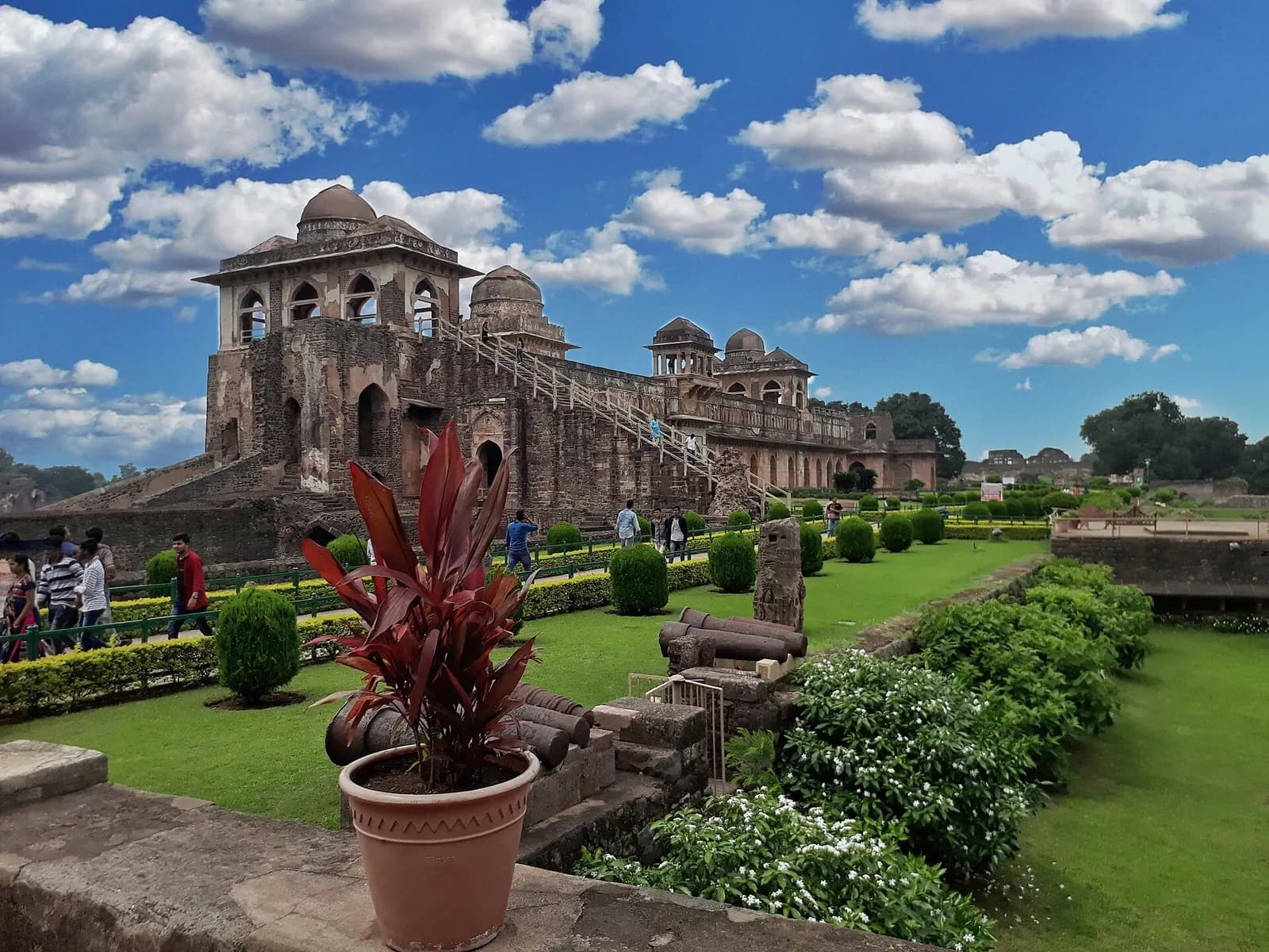 Jahaz Mahal at Mandu with its domed pavilions reflected in the monsoon-filled Munj tank