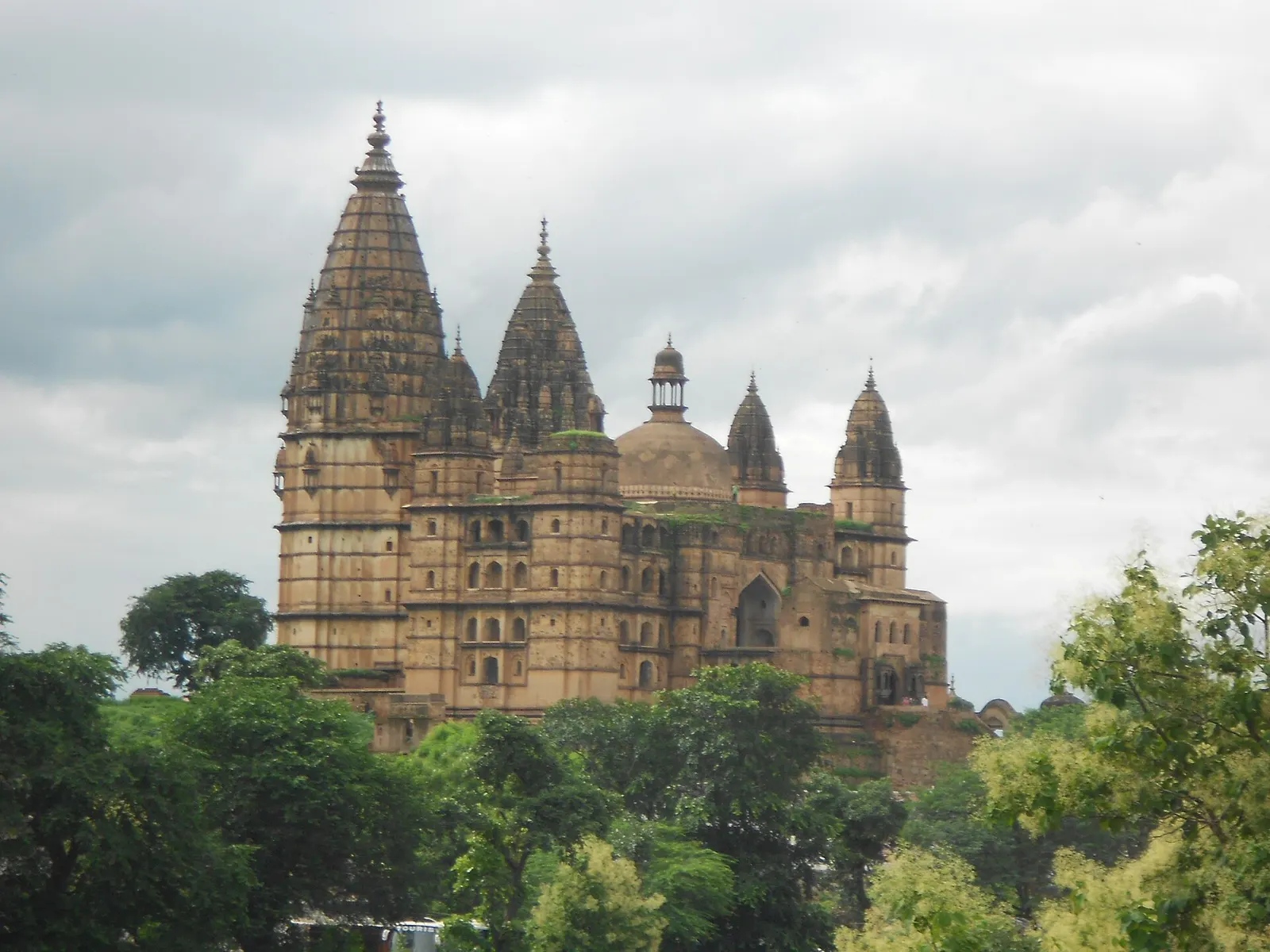 Bundela chhatris of Orchha rising above the Betwa river at sunset