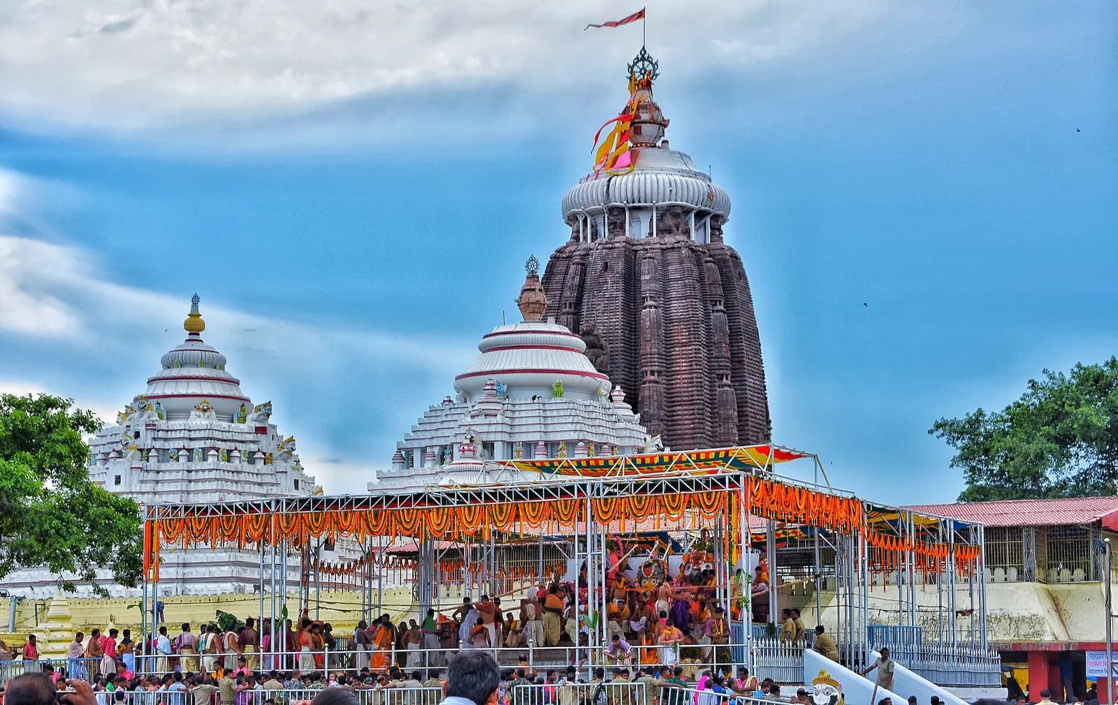 The tall tower of the Jagannath Temple at Puri rising above the town's rooftops
