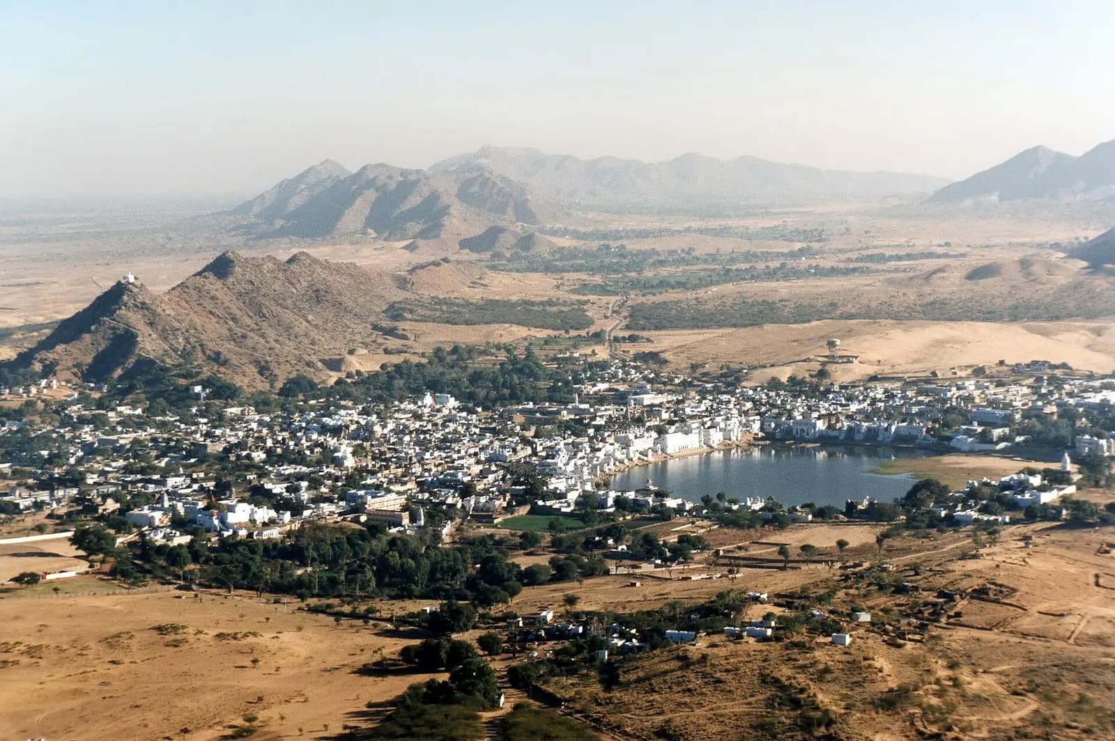 Pushkar Lake with its ghats and temples seen from the hills above the town