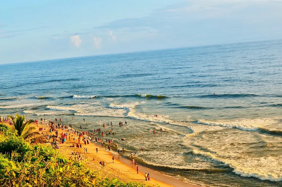 The red laterite cliff above Papanasam beach at Varkala in Kerala