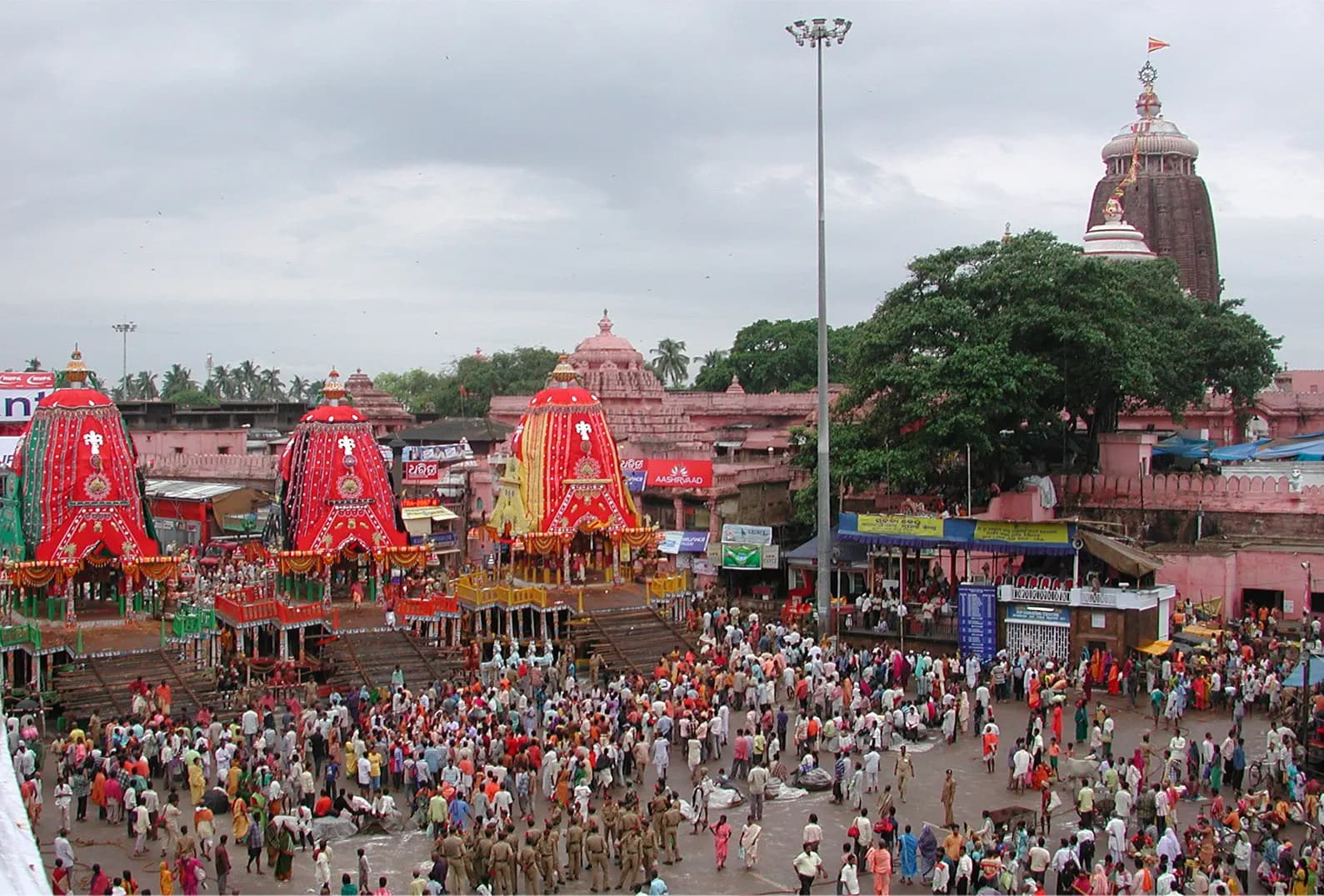 Crowds pulling the towering chariots of Jagannath along the Grand Road in Puri