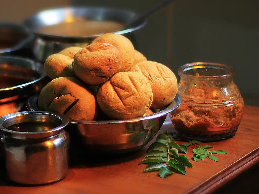 A Rajasthani plate of baati with dal and ghee