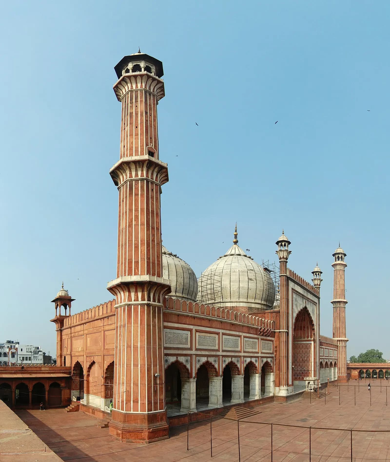 The red sandstone facade and minarets of Jama Masjid in Old Delhi
