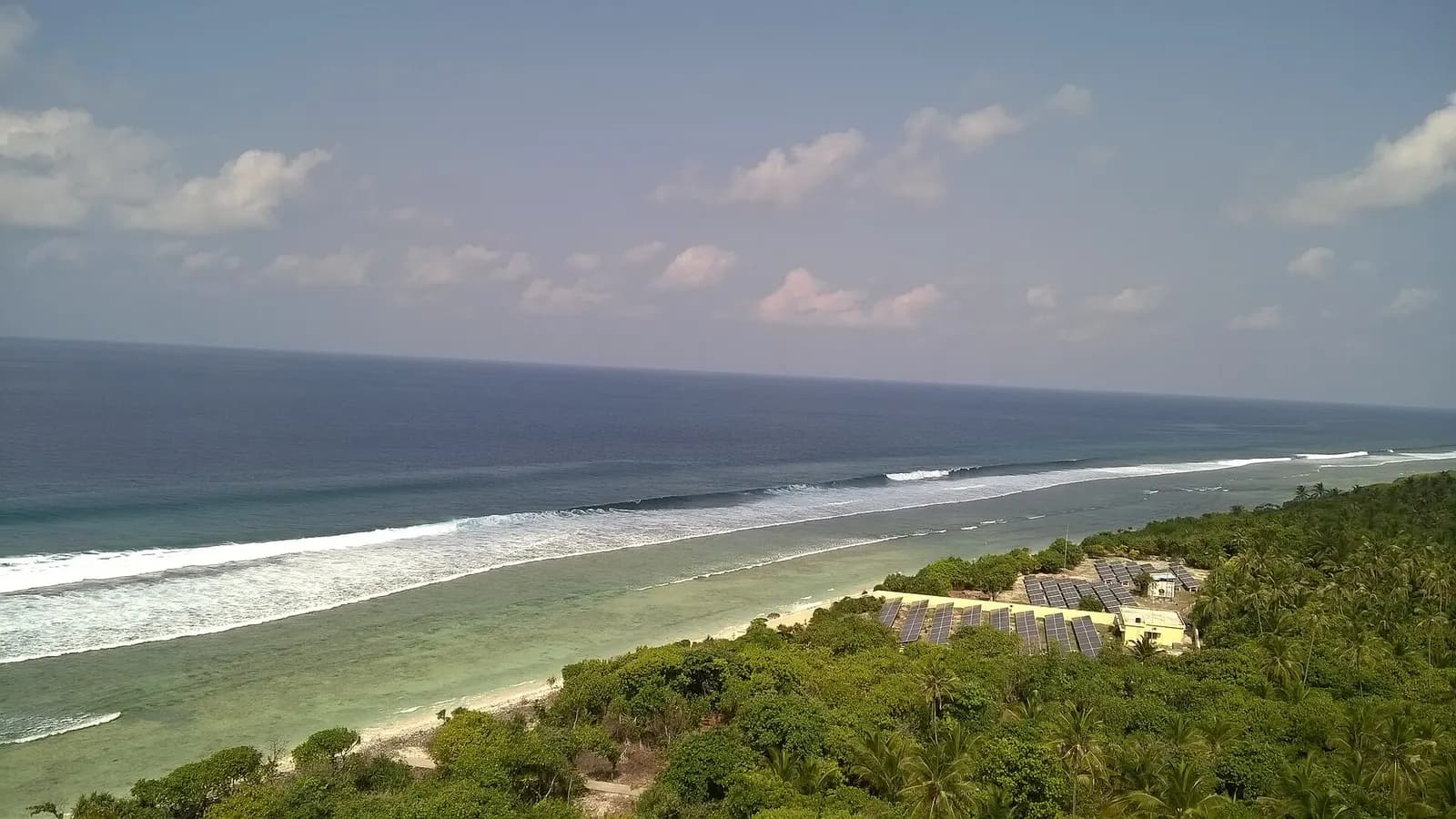 The lagoon and palm-fringed shore of Minicoy Island, Lakshadweep