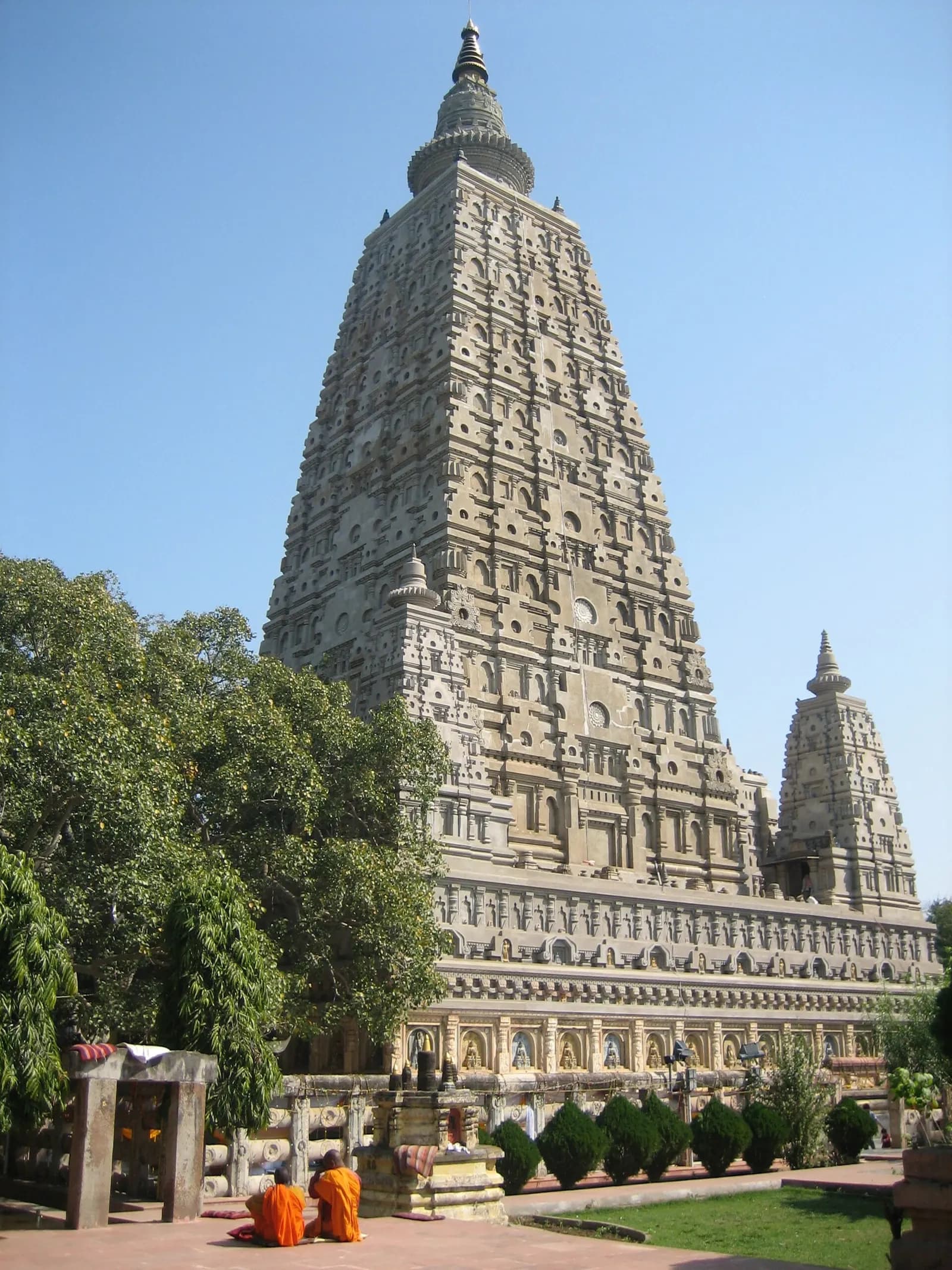 The brick tower of the Mahabodhi Temple at Bodh Gaya rising above the Bodhi tree compound